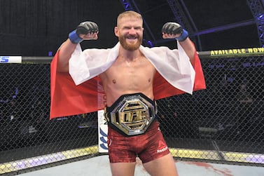 Jan Blachowicz of Poland celebrates after defeating Dominick Reyes in their light heavyweight championship bout at UFC 253 in Abu Dhabi. Josh Hedges/Zuffa LLC