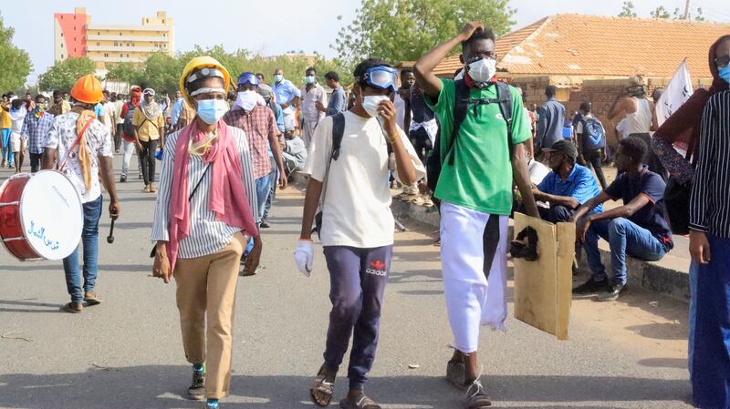 Protesters take part in a rally against military rule, after the last coup and to commemorate the third anniversary of revolution, in Khartoum, Sudan. Reuters