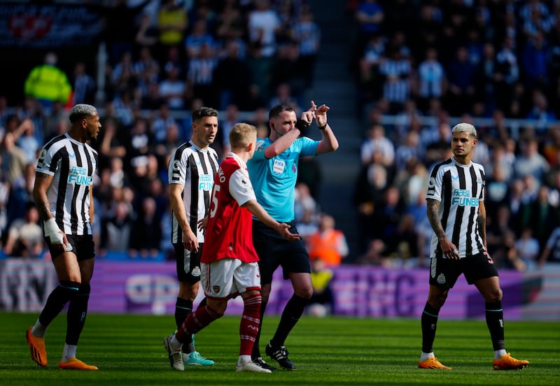 Referee Chris Kavanagh overturns a penalty kick awarded to Newcastle following a VAR check. AP 