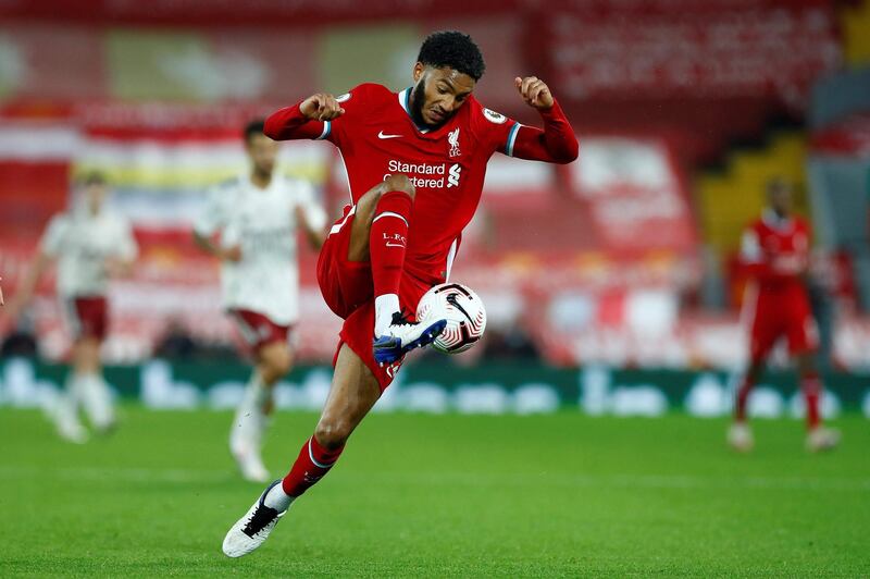 Joe Gomez. 7 - A good performance for the most part; he did well to turn away a dangerous cross from Willian, but he did allow Lacazette a golden opportunity when the France striker snuck in behind. Excellent pace and smart distribution. AFP