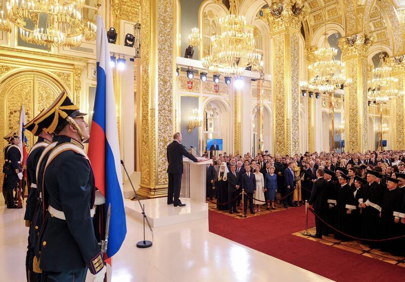 Vladimir Putin takes the oath at the Kremlin in Moscow. Alexey Druzhinin / AFP