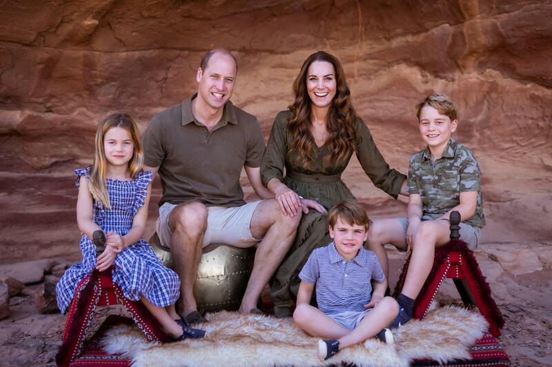 William and Kate with their three children, from left, Princess Charlotte, Prince Louis and Prince George, during a visit to Jordan in 2021. Reuters