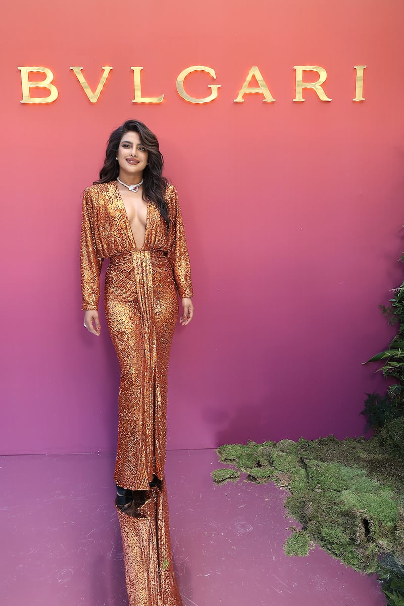 Priyanka Chopra, in an orange sequin dress by Rasario,  attends the Bulgari Eden the Garden Of Wonders event in Paris on June 6, 2022. Getty Images