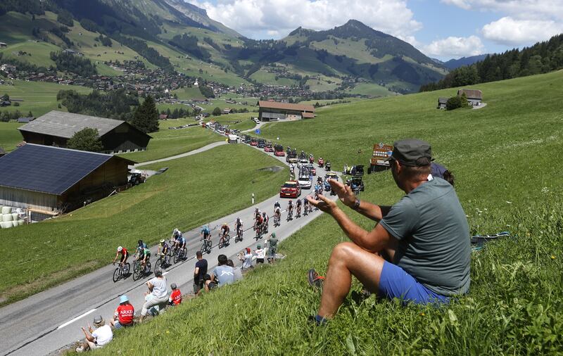 Spectators watch the action during Stage 9. EPA