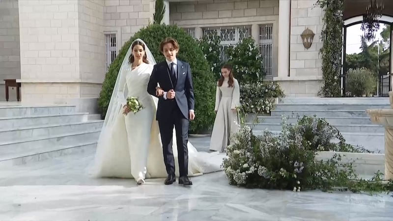 Jordan's Prince Hashem bin Abdullah, the younger brother of Crown Prince Hussein, escorts the bride to her wedding ceremony. Photo: Royal Hashemite Court