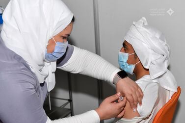 A man is immunised against Covid-19 at one of the 120 centres in Dubai that offer the vaccine. Dubai Media Office