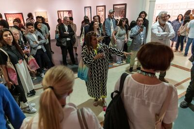 Sheikha Hoor leads a tour of the Sharjah Art Museum biennial exhibitions. Antonie Robertson / The National


