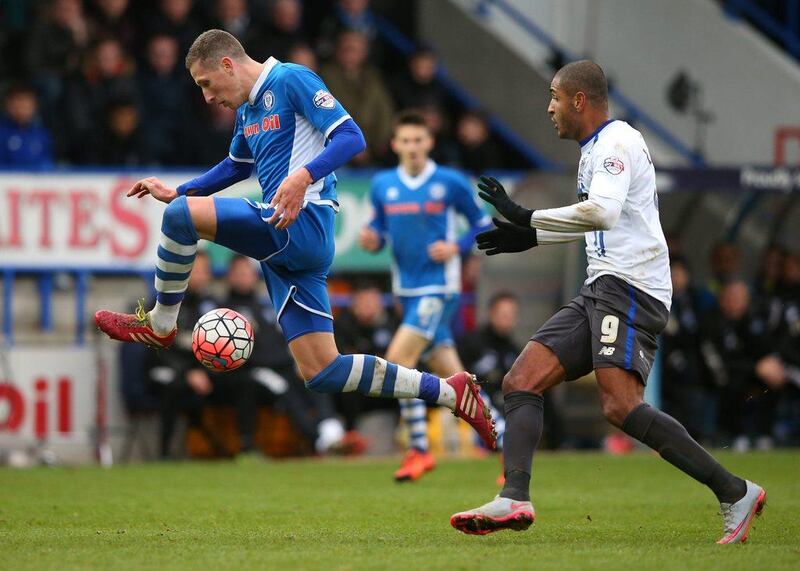 Jimmy McNulty of Rochdale controls the ball against Bury's Leon Clarke during their FA Cup second round match on Sunday. Alex Livesey / Getty Images