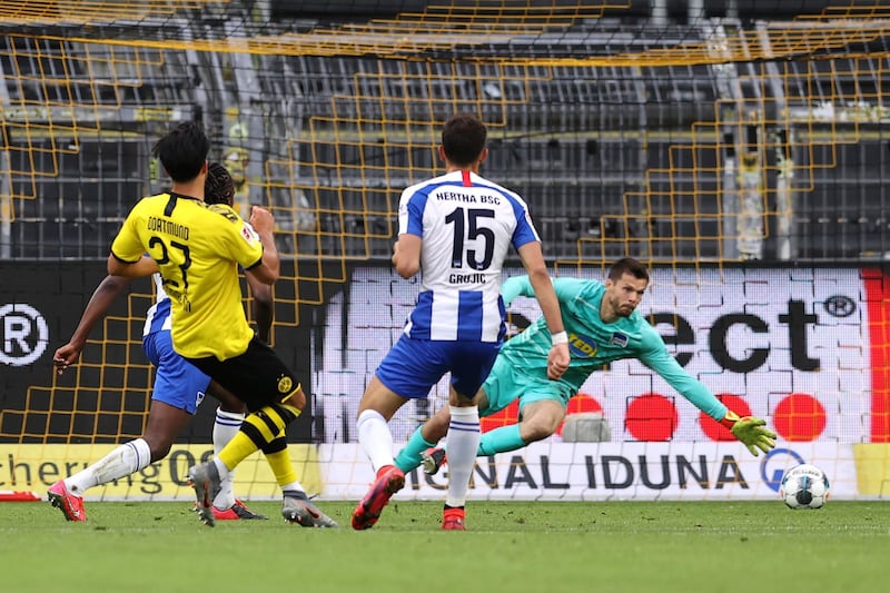 Dortmund's Emre Can scores against Hertha. Getty