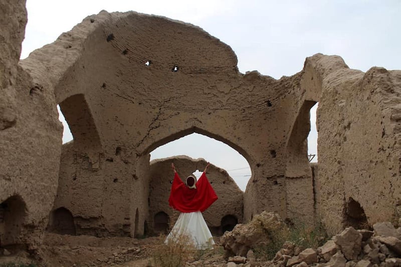 Fahima Mirzaie, 24, dances in the ruins believed to be Rumi's birthplace. Courtesy Fahima Mirzaie