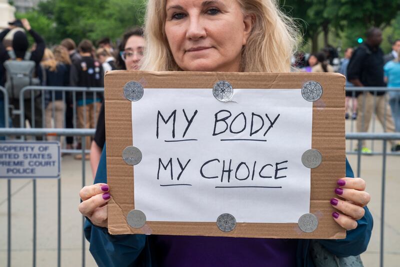 A pro-choice protester in front of the Supreme Court in Washington. EPA