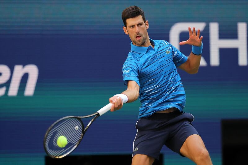 Novak Djokovic returns a shot against Roberto Carballes Baena. AFP