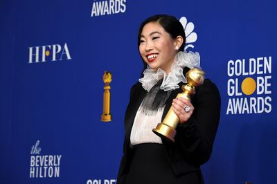 epa08106404 Awkwafina holds the award for Best Performance by an Actress in a Motion Picture - Musical or Comedy for 'The Farewell' in the press room during the 77th annual Golden Globe Awards ceremony at the Beverly Hilton Hotel, in Beverly Hills, California, USA, 05 January 2020.  EPA/CHRISTIAN MONTERROSA