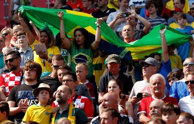 Soccer Football - International Friendly - Brazil vs Croatia - Anfield, Liverpool, Britain - June 3, 2018   Brazil fans with a flag   Action Images via Reuters/Andrew Boyers