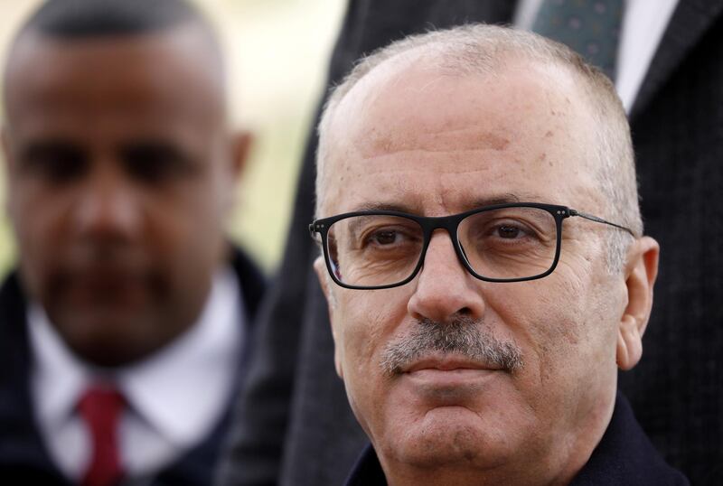epa07327314 Palestinian Prime Minister Rami Hamdallah speaks during an opening ceremony of a medical center in the West Bank village of Beit Ula, near Hebron, 28 January 2019. According to media reports, a Palestinian government spokesman said on 28 January that Prime Minister Rami Hamdallah offered to step down to clear the way for President Mahmoud Abbas to form a new government, one day after the Fatah Central Committee recommended the formation of a new government to replace the current national reconciliation cabinet.  EPA/ABED AL HASHLAMOUN