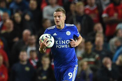 Leicester City's English striker Jamie Vardy celebrates scoring the team's first goal during the English Premier League football match between Manchester United and Leicester City at Old Trafford in Manchester, north west England, on August 10, 2018. (Photo by Oli SCARFF / AFP) / RESTRICTED TO EDITORIAL USE. No use with unauthorized audio, video, data, fixture lists, club/league logos or 'live' services. Online in-match use limited to 120 images. An additional 40 images may be used in extra time. No video emulation. Social media in-match use limited to 120 images. An additional 40 images may be used in extra time. No use in betting publications, games or single club/league/player publications / 