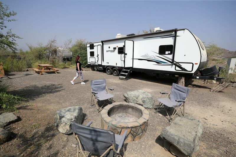 Family-friendly caravans offer a more affordable place to spend the night at Hatta Wadi Hub. Chris Whiteoak / The National