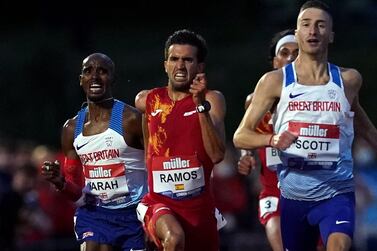 Great Britain's Sir Mo Farah (left) sprints to the finish line for down the field at the 10,000m Championships in Birmingham. PA