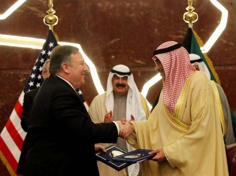 US Secretary of State Mike Pompeo shakes hands with Kuwait's Foreign Minister Sheikh Sabah Al-Khalid Al-Sabah in Kuwait. Reuters