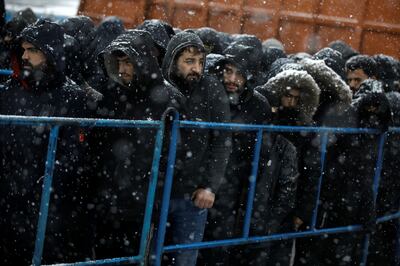 Migrants at a transport and logistics centre near the Belarusian-Polish border in the Grodno region, Belarus, November 23, 2021. Reuters