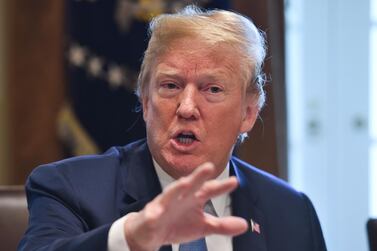 US President Donald Trump was the subject of a deepfake video earlier this year designed to warn about the dangers the tool poses to democracy. AFP