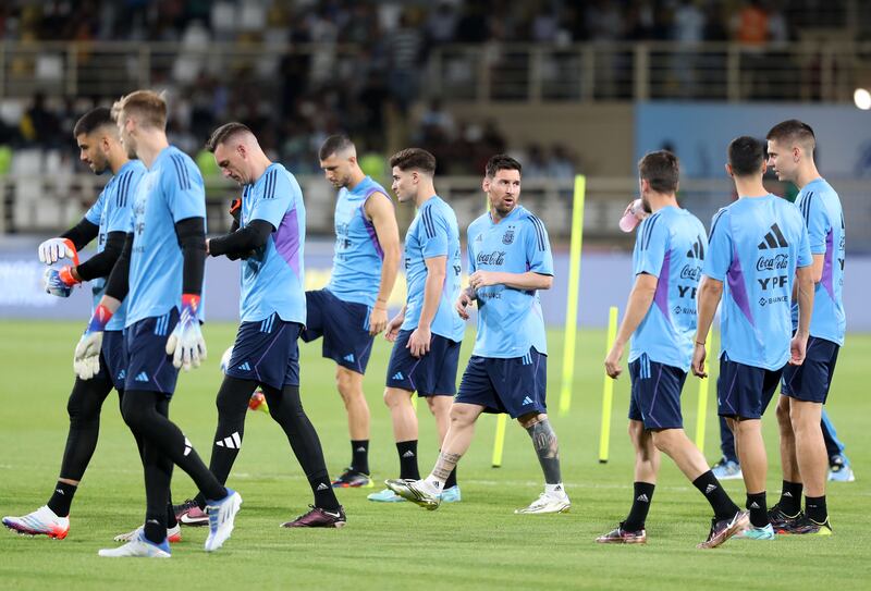 Argentina's Lionel Messi with teammates at Al Nahyan Stadium in Abu Dhabi.