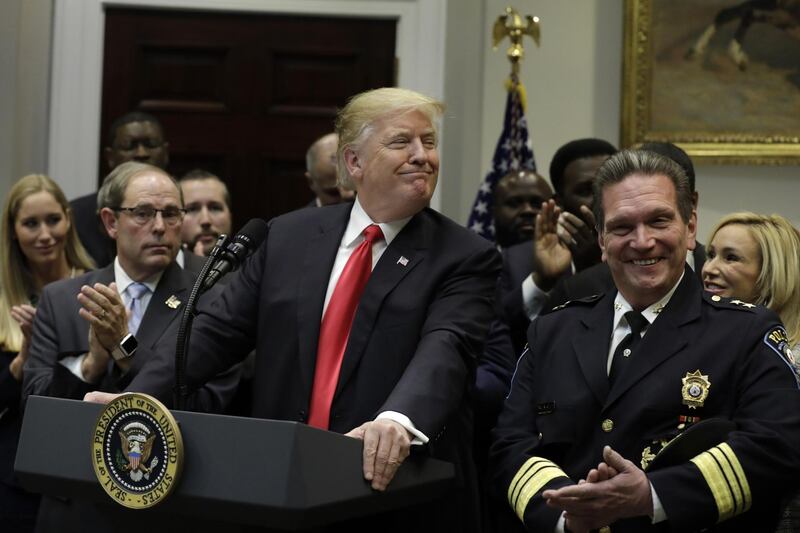 U.S. President Donald Trump smiles during a signing ceremony for H. R. 5682, First Step Act, in the Roosevelt Room of the White House in Washington, D.C., U.S., on Wednesday, Nov. 14, 2018. Trump endorsed proposed legislation that would change criminal sentencing rules and provide new assistance to some ex-cons, in a bid to build momentum for a bill that top Senate Republicans say is unlikely to pass this year. Photographer: Yuri Gripas/Bloomberg