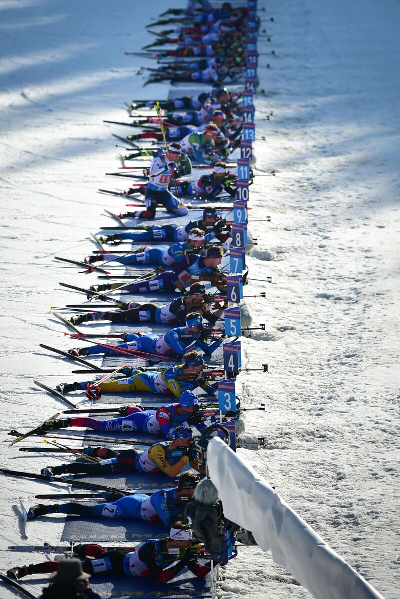 Competitors at the shooting range in the men's 4x7.5 km relay event at the IBU Biathlon World Championships in Pokljuka, Slovenia, on Sunday February 20. AFP