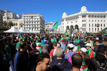 Demonstrators hold flags during anti government protests in Algiers, Algeria April 26, 2019. Reuters
