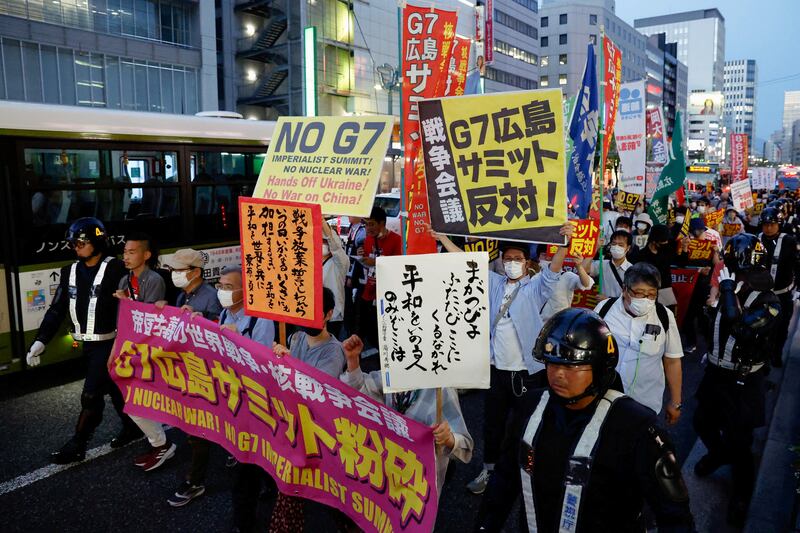 Anti-G7 protesters march through Hiroshima, Japan, where a G7 meeting was to be held. Reuters