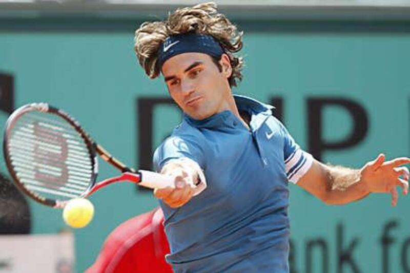 Roger Federer took his time but was rarely troubled in his third round match with Julian Reister.