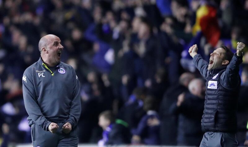 Soccer Football - FA Cup Fifth Round - Wigan Athletic vs Manchester City - DW Stadium, Wigan, Britain - February 19, 2018   Wigan Athletic manager Paul Cook and assistant manager Leam Richardson celebrate their first goal scored by Will Grigg    Action Images via Reuters/Carl Recine