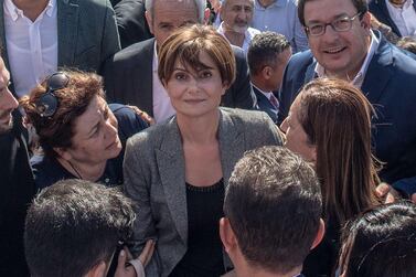Surrounded by supporters, Republican People's Party Istanbul Provincial Chair Canan Kaftancioglu leaves court in Istanbul, Turkey, after being sentenced to nine years and eight months in prison, mainly over social media posts. AFP