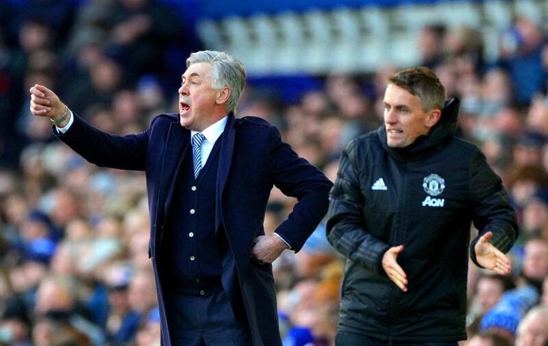 Everton manager Carlo Ancelotti, left, and Manchester United Coach Kieran McKenna at the touchline in Goodison Park. PA
