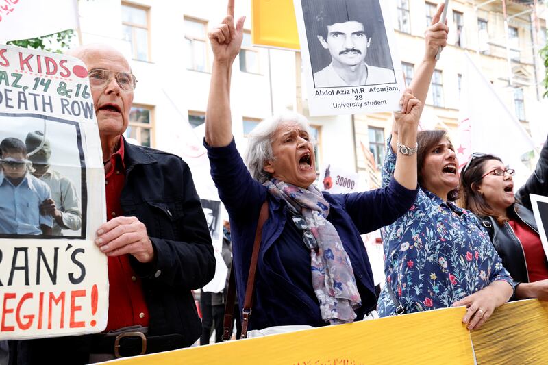 Protesters outside the trial of Hamid Nouri, 60, in Stockholm, Sweden. Photo: TT News