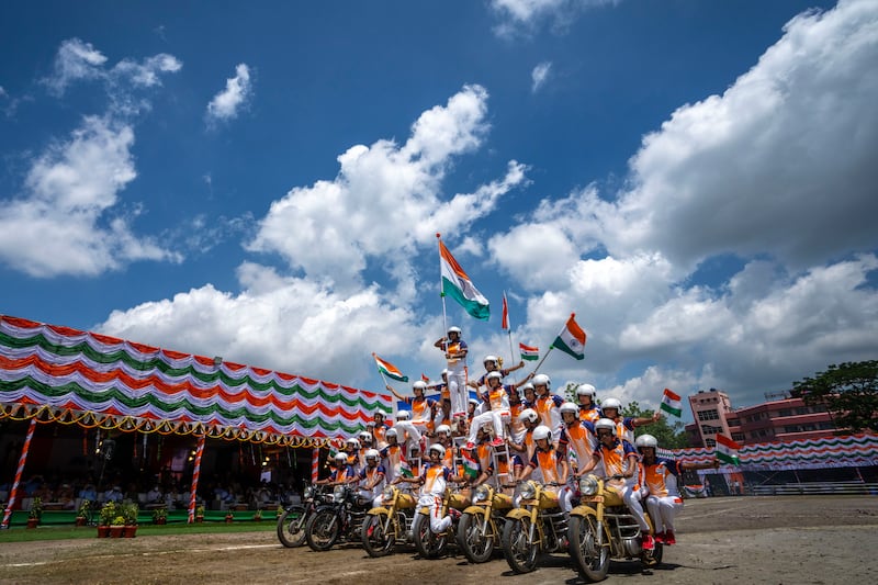 Women police commandos display their motorcycling skills to celebrate India's Independence Day in Gauhati, in north-eastern Assam state. AP Photo