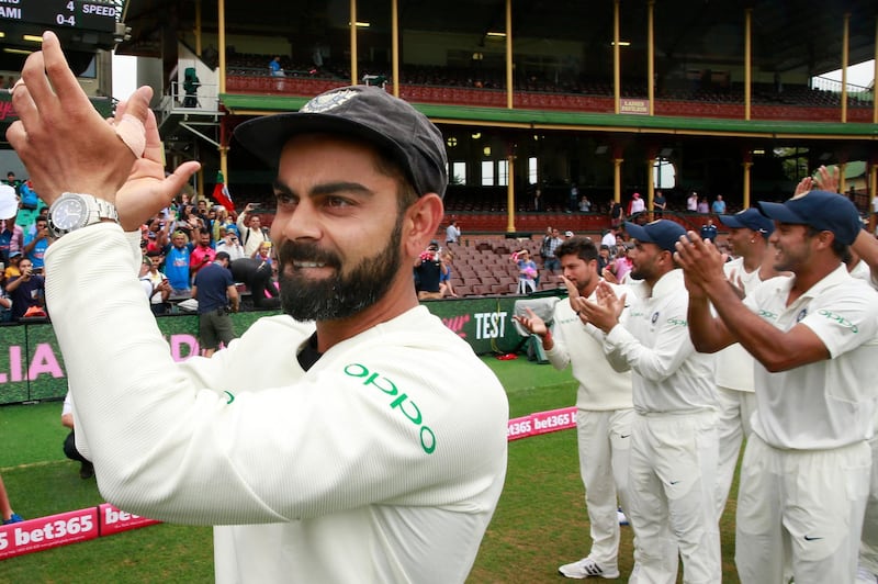 SYDNEY, AUSTRALIA - JANUARY 07: Virat Kohli and The Indian Cricket Team celebrate winning the Border-Gavaskar trophy during day five of the fourth Test match in the series between Australia and India at Sydney Cricket Ground on January 07, 2019 in Sydney, Australia. (Photo by Mark Evans/Getty Images)