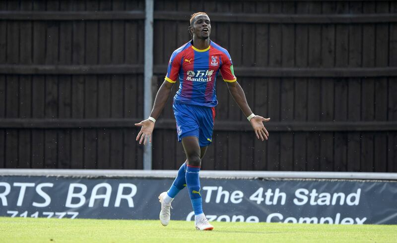 OXFORD, ENGLAND - JULY 21:  Crystal Palace  striker Wilfried Zaha celebrates his goal during a Pre-Season Friendly match between Oxford United and Crystal Palce at Kassam Stadium on July 21, 2018 in Oxford, England.  (Photo by Stu Forster/Getty Images)