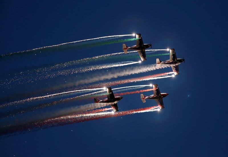 The Pioneer Team, a civil aerobatic team from Italy, let off pyrotechnics from their Pioneer 330 aircraft during the Malta International Airshow off SmartCity Malta, outside Valletta. Reuters