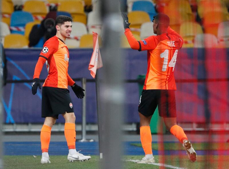 Shakhtar Donetsk's Manor Soloman celebrates scoring the second goal with Mateus Tete. Reuters