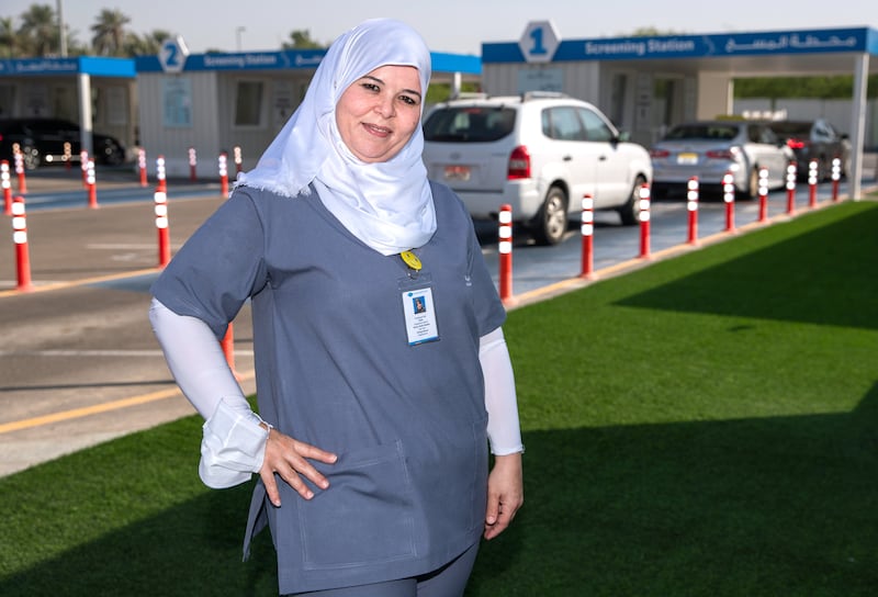 Name: Sanaa Shebl Shoker
Age: 45
Nationality: Egyptian.
Work: PCR technician at Seha Covid-19 drive-through centre, in Al Manhal, Abu Dhabi for nine months.
Past Work: Charge nurse at Al Mushrif Children's Specialty Centre.
Question: What has been the biggest challenge you've faced while being a PCR frontline worker? Answer: "As frontline worker, I had been dealing with the pandemic head-on for almost a year.
That’s a year of face masks. A year of dealing with angry customers. A year of
health uncertainty. We all know that people have every right to be tired."