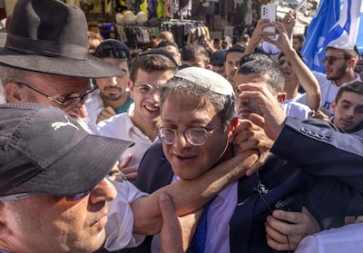 Itamar Ben-Gvir being greeted by supporters during a rally in Jerusalem. AFP