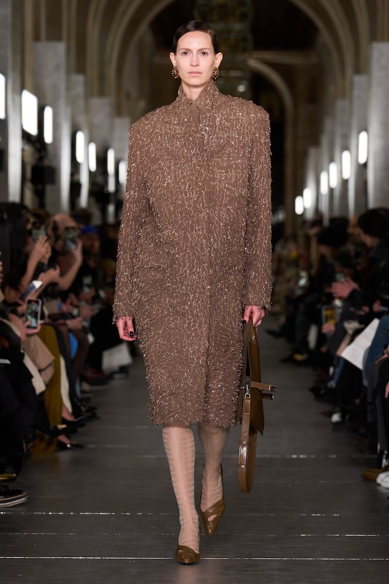 Coats came with a surprisingly chic addition of shimmer at Tory Burch. Photo: Tory Burch 