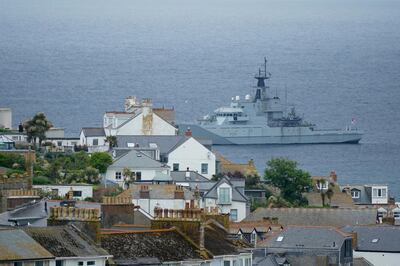 The British Royal Navy patrols Carbis Bay in St. Ives, Cornwall, England, Thursday, June 10, 2021. Security in the area is being tightened ahead of the upcoming G7 meeting taking place in Carbis Bay. G7 leaders and guests will meet in the the Cornish resort starting Friday, June 11, 2021. (AP Photo/Jon Super)