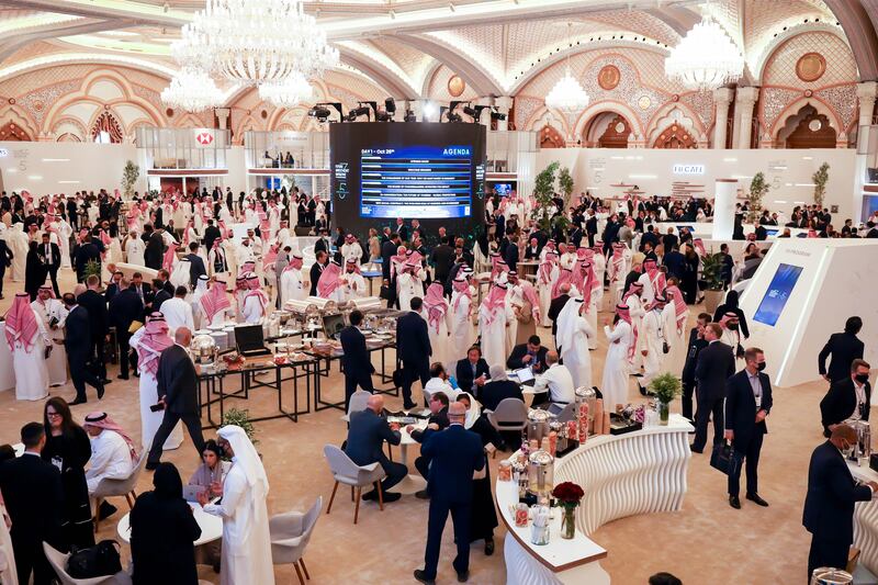 Attendees between panel sessions at the FII conference in Riyadh.  Bloomberg