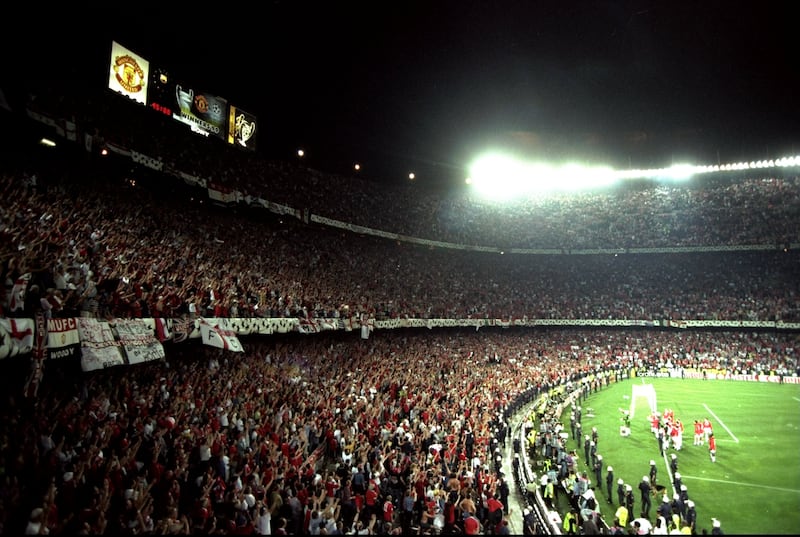 Manchester United fans celebrate victory in the Champions League final against Bayern Munich in the Camp Nou Stadium in 1999. Getty Images