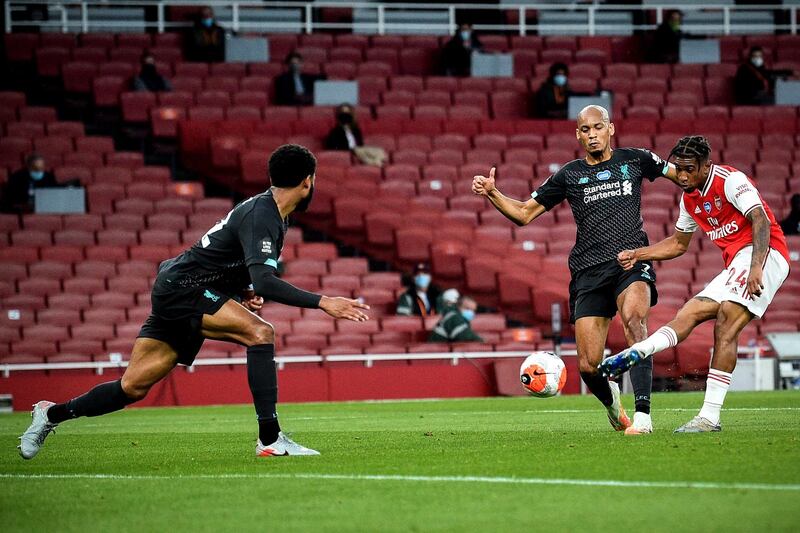 Arsenal's Reiss Nelson scores their second goal. EPA