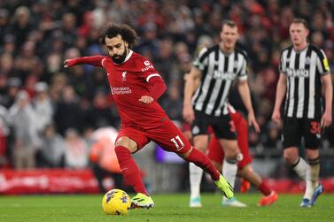 LIVERPOOL, ENGLAND - JANUARY 01: Mohamed Salah of Liverpool takes a penalty during the Premier League match between Liverpool FC and Newcastle United at Anfield on January 01, 2024 in Liverpool, England. (Photo by Jan Kruger / Getty Images)