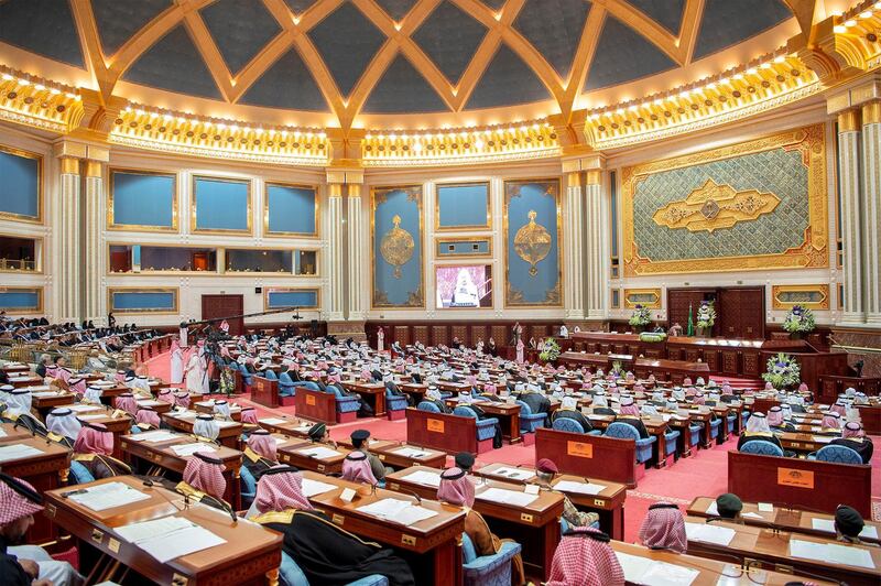 Members of Shura Council gather to listen to a speech by King Salman. Saudi Royal Court / Reuters