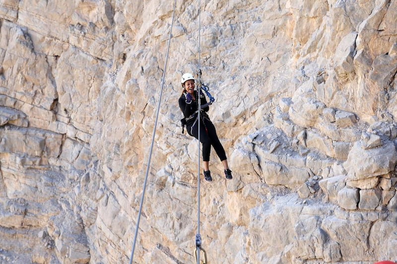 A trekker tries out a zip line operated by Absolute Adventure at Jebel Jais in Ras Al Khaimah. Pawan Singh / The National